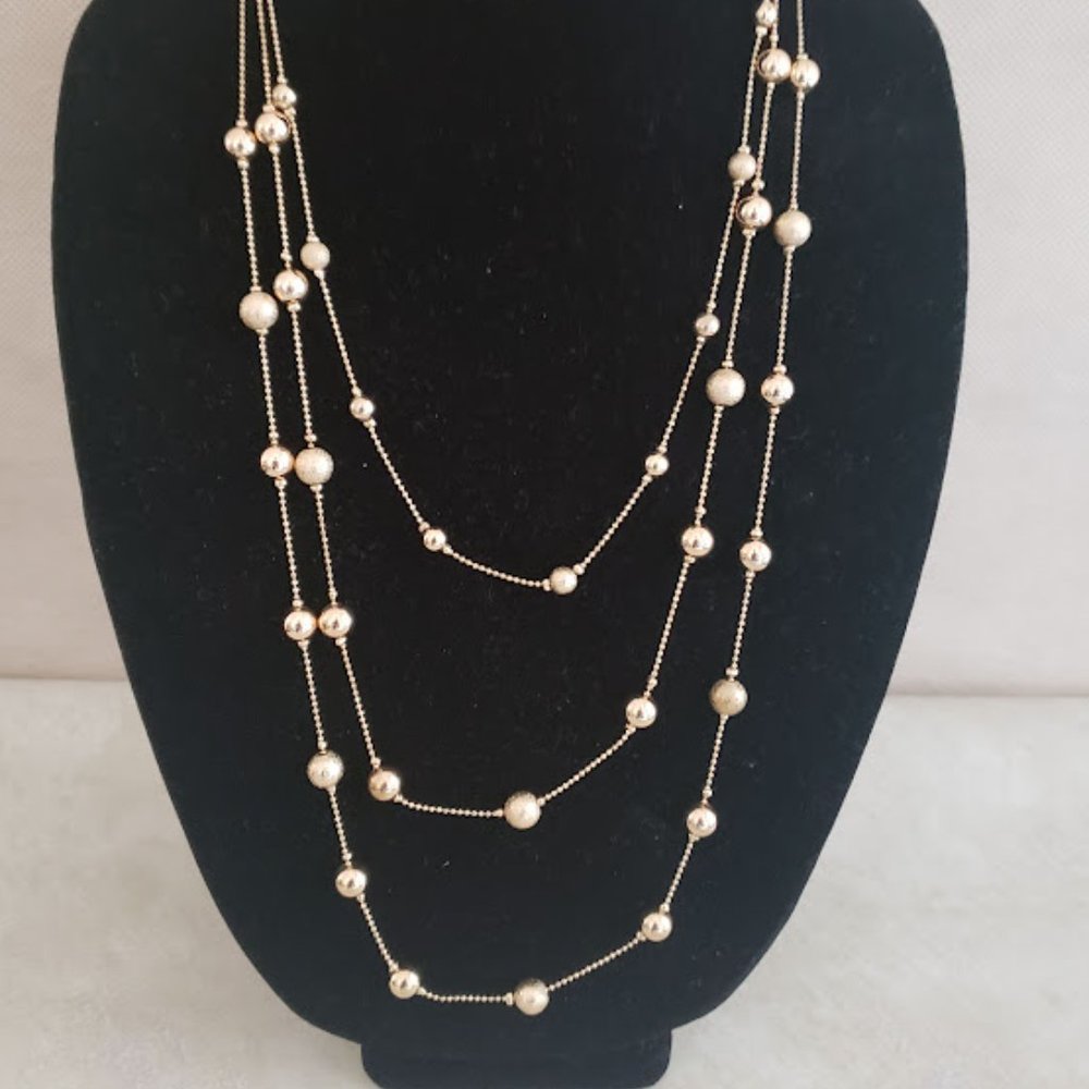 MONET Triple Strand Gold Tone Necklace